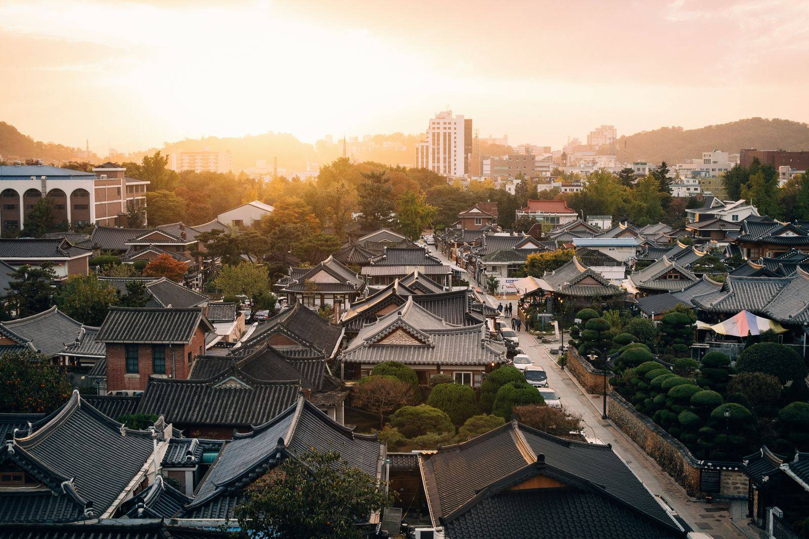 Traditional hanok rooftops in Jeonju, South Korea, at sunset